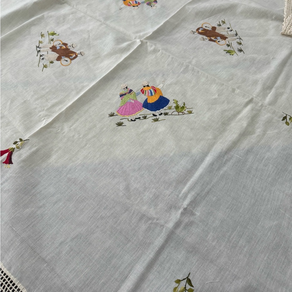 Vintage linen tablecloth with Bolivian themed hand embroidery